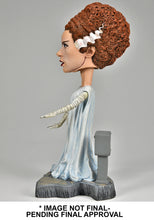 Load image into Gallery viewer, side of figure on display