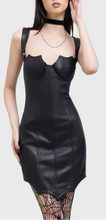 Load image into Gallery viewer, Model wearing a black vegan leather dress with fishnet stockings and platform boots on a white background