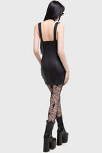 Load image into Gallery viewer, Model wearing a black vegan leather dress with fishnet stockings and platform boots on a white background