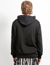 Load image into Gallery viewer, model showing back of hoodie