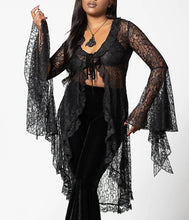 Load image into Gallery viewer, Model wearing a black lace top with a plain background