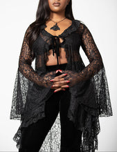 Load image into Gallery viewer, Model wearing a black lace top with a plain background