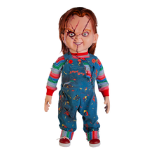 Load image into Gallery viewer, Doll is clothed with good guy overalls, long sleeve shirt and red sneakers. Doll has two black eyes and scars/stitches along face