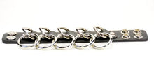 Load image into Gallery viewer, black leather bracelet with five silver d rings with five hanging silver o rings attached. shows snap closure