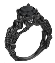 Load image into Gallery viewer, Black skeleton band and large black cubic zirconia on top center.