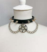 Load image into Gallery viewer, Black leather collar with 1/2" silver spikes, silver chain detail, and 2" silver inverted pentagram hanging from front center.