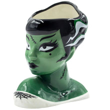 Load image into Gallery viewer, side of vase on display