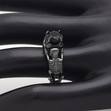 Load image into Gallery viewer, Black skeleton band and large black cubic zirconia on top center.