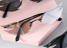 Load image into Gallery viewer, glasses on display