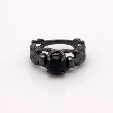 Load image into Gallery viewer, Black skeleton band and large black cubic zirconia on top center.