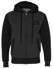 Load image into Gallery viewer, front of Lucky 13 charcoal gray heather black zip-up hooded sweatshirt has jacquard ribbing at cuffs and waistband and gunmetal eyelets. Hoodie has classic "Skull Stars" logo in grey (tonal) on the back with the skull stars embroidered patch (also tonal in dark charcoal) on the front left chest.
