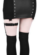 Load image into Gallery viewer, back view of black leg garter with vegan leather statement pentagram. Has adjustable elastic back, stud detail and suspender holders.