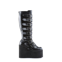 Load image into Gallery viewer, outer side view of black vegan leather 5 1/2" wedge platform Goth punk gogo knee high boot Adjustable straps from top to bottom of boot, with metal plates up the front with full back zipper
