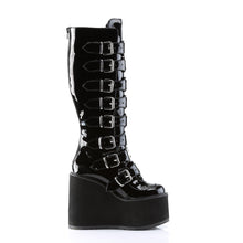 Load image into Gallery viewer, outer side view of black vinyl 5 1/2" wedge platform Goth punk gogo knee high boot Adjustable straps from top to bottom of boot, with metal plates up the front with full back zipper