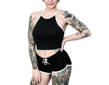 Load image into Gallery viewer, women's Black shorts with white trim and white heart designs on both buttcheeks. left heart says "fuck off" and right heart says "fuck you." with white drawstring