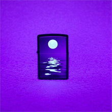 Load image into Gallery viewer, front of zippo on display under blacklight