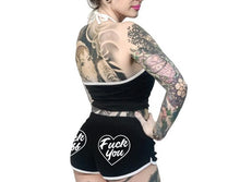 Load image into Gallery viewer, women's Black shorts with white trim and white heart designs on both buttcheeks. left heart says "fuck off" and right heart says "fuck you." with white drawstring