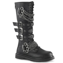 Load image into Gallery viewer, right side view of black vegan leather knee high combat boot with 1.25" heel, 20 eyelet lace-up, brass knuckle with chain on top of shoe and base of shoe with three adjustable straps in the middle, full zipper on backside