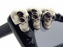 Load image into Gallery viewer, up close details of the skulls