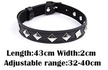Load image into Gallery viewer, Silver pyramid studs placed with corners up to look like diamond shapes on black vegan leather choker.