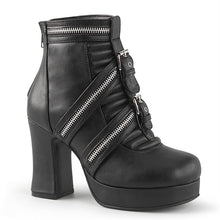 Load image into Gallery viewer, Outer side view of Black vegan leather with 3 3/4" block heel and 1" platform ankle boot Features triple zippered straps and two buckled straps at center, full back zip closure