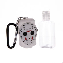 Load image into Gallery viewer, rubber jason voorhees hockey mask hand sanitizer holder. empty bottle included. bottle holder has carabiner