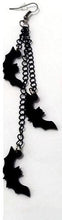 Load image into Gallery viewer, Three silver zinc alloy chains hanging from hook stud. Chains hang at different lengths with an acrylic black see-through bat hanging from each chain.