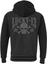 Load image into Gallery viewer, back of Lucky 13 charcoal gray heather black zip-up hooded sweatshirt has jacquard ribbing at cuffs and waistband and gunmetal eyelets. Hoodie has classic "Skull Stars" logo in grey (tonal) on the back with the skull stars embroidered patch (also tonal in dark charcoal) on the front left chest.