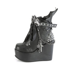 Load image into Gallery viewer, inner view of 5" wedge platform Wedge ankle bootie style boot Features wrap around studded & spike straps Bat buckle detail Chain with various hanging charms Batwing detail up the back Inside metal zip closure.