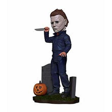 Load image into Gallery viewer, figure on display