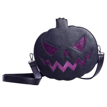 Load image into Gallery viewer, Matte black vinyl jack o lantern purse with sparkly glitter vinyl stitched details. Purse has adjustable strap, zip closure, leopard print satin lining and a zippered pocket on the inside. Can be worn as a cross body bag, or on the shoulder.