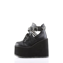 Load image into Gallery viewer, inner side view of black vegan leather 5.5" wedge platform Mary Jane style Lace-up front Wrap around style studded adjustable strap around ankle