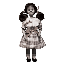 Load image into Gallery viewer, talky tina replica doll with pig tails, wearing a plaid dress with bow around the waist, and black flats with white socks