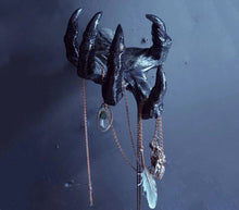 Load image into Gallery viewer, front view of Black witch hand statue with necklaces hanging from the fingers