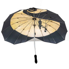 Load image into Gallery viewer, umbrella on display from the bottom
