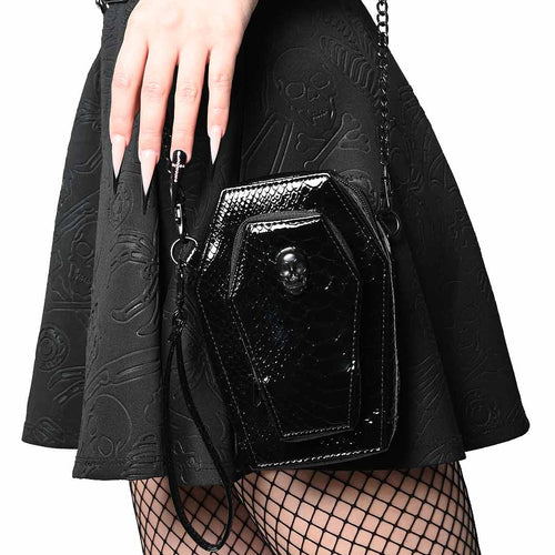 model holding purse