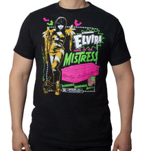 Load image into Gallery viewer, Model wearing black t-shirt with colorful graphic design featuring &#39;Elvira, Curse of the Mistress&#39; on a white background.
