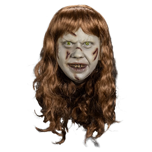 Scary mask with brown hair on a white background