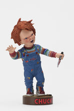 Load image into Gallery viewer, front of Head knocker bobble head of Chucky from Child&#39;s Play 2. Chucky has his right hand up, mouth open as if he is yelling, and in his left hand is clutching a knife. Chucky stands on a small round platform that reads &quot;CHUCKY&quot; in red letters on the front.

