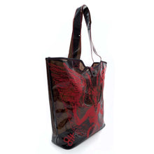 Load image into Gallery viewer, See-through black PVC beach tote. Bag has red Baphomet print on it. Bag has a double handle and snap closure.
