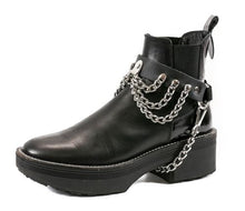 Load image into Gallery viewer, black ankle boot displaying black leather boot strap with front hanging three row silver chains and hanging silver chain underneath booth
