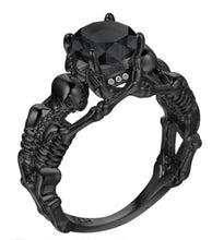 Load image into Gallery viewer, Black skeleton band and large black cubic zirconia on top center.
