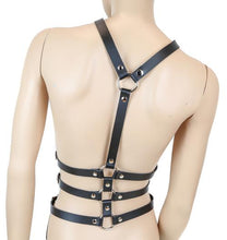 Load image into Gallery viewer, mannequin displaying back side of black leather y shaped body harness. shows three adjustable buckles on each side of torso and silver o ring details
