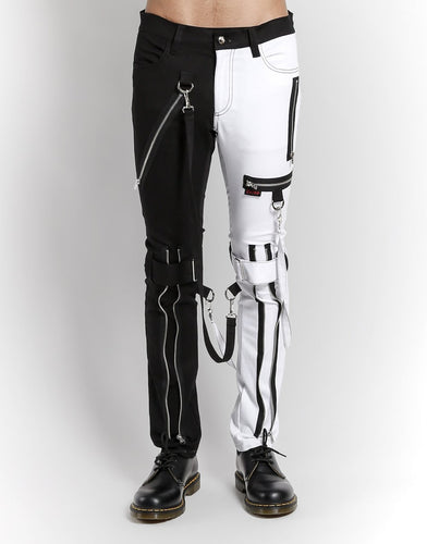 front of Classic slim White/Black split leg pants with removable bondage straps and zipper details. Pant legs can be zipped for a change in fit, topped off with a zip fly and button closure.