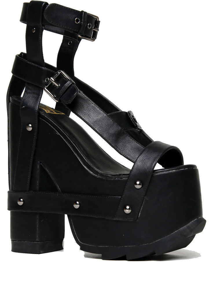 outer view of black vegan leather strappy platform sandal with 6.5
