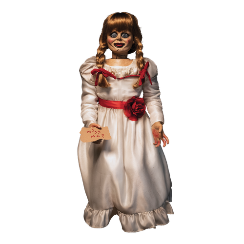 doll wearing white long sleeve dress with red carnation accessory belt. doll is holding parchment paper that reads 