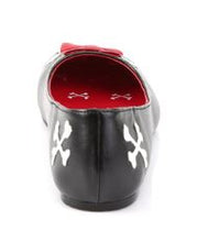 Load image into Gallery viewer, back view of Black vegan leather flats with skull and crossbone with red bow on front center of toe and cross bones on back left/right of shoe.
