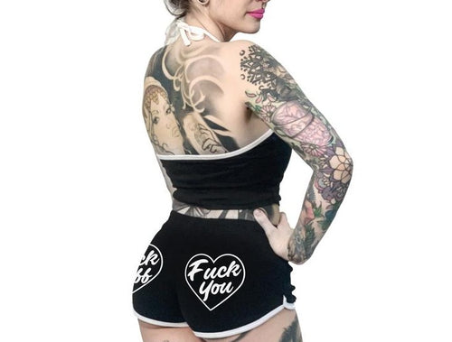 women's Black shorts with white trim and white heart designs on both buttcheeks. left heart says 