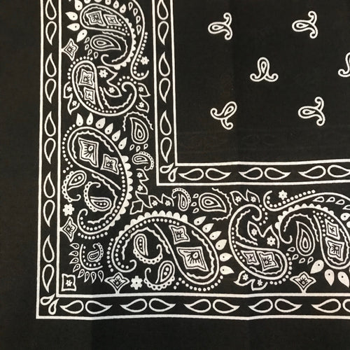 Black bandana with white paisley pattern.