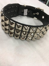 Load image into Gallery viewer, black leather collar with three rows of multiple silver pyramid studs. show adjustable buckle closure
